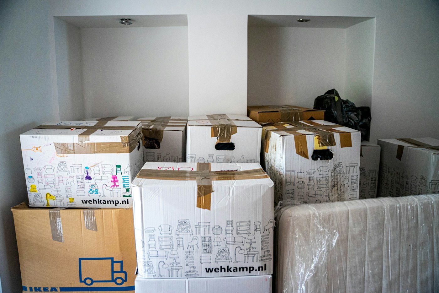 Packed moving boxes in a room